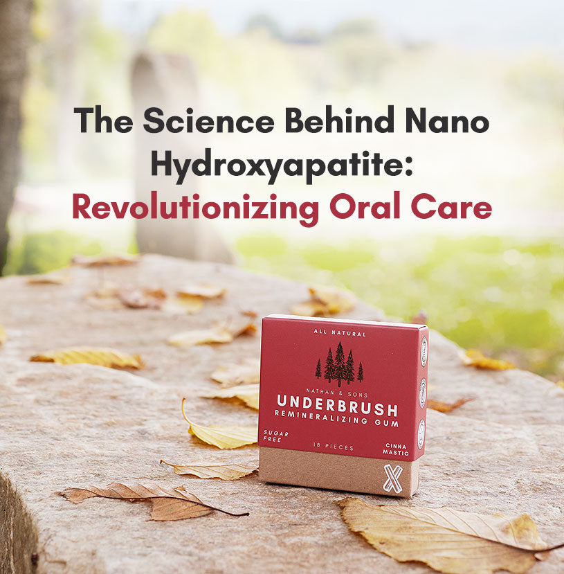 Underbrush Cinna Mastic Remineralizing Gum on a stone with autumn leaves, with text about nano hydroxyapatite in oral care.