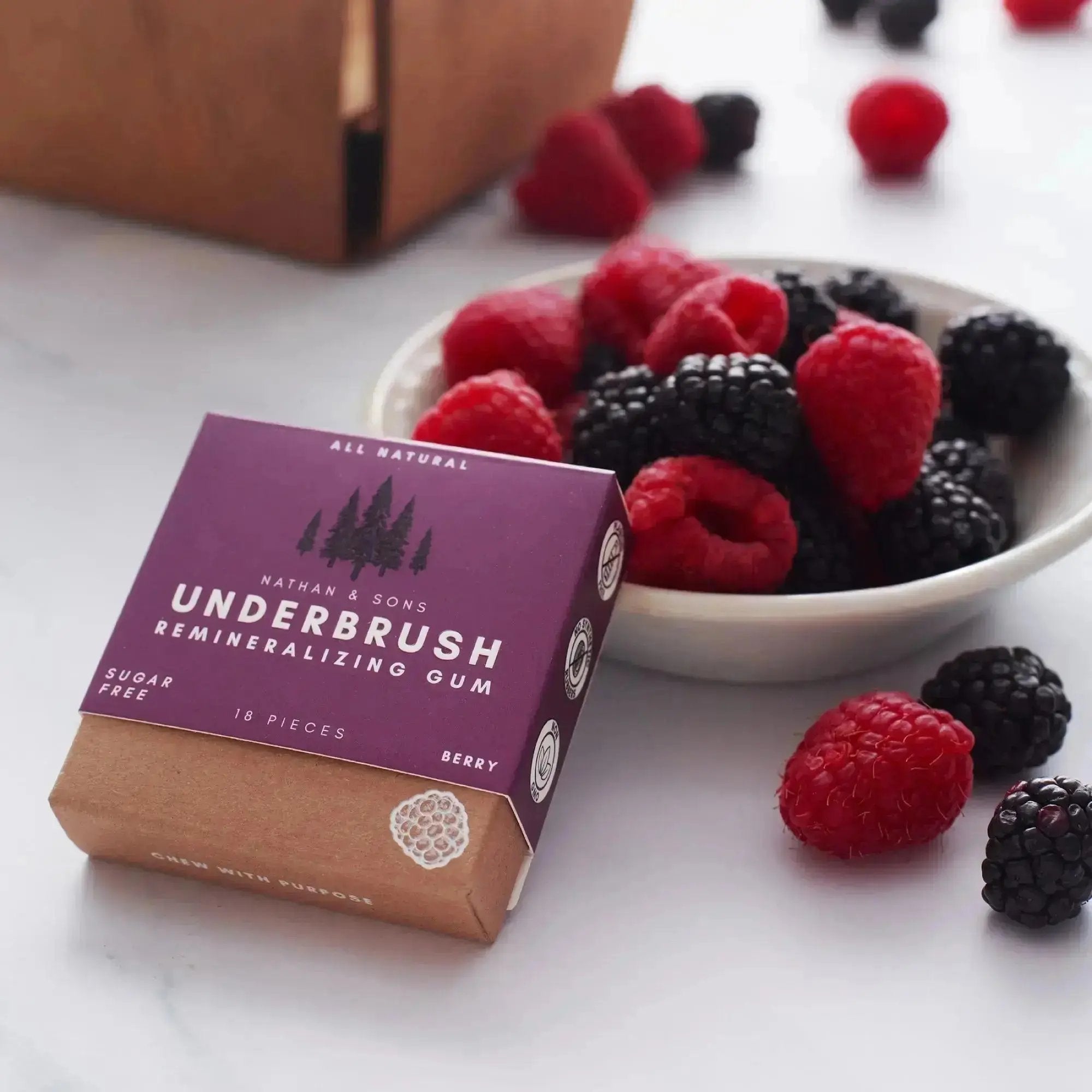 Underbrush Berry Remineralizing Gum with fresh raspberries and blackberries