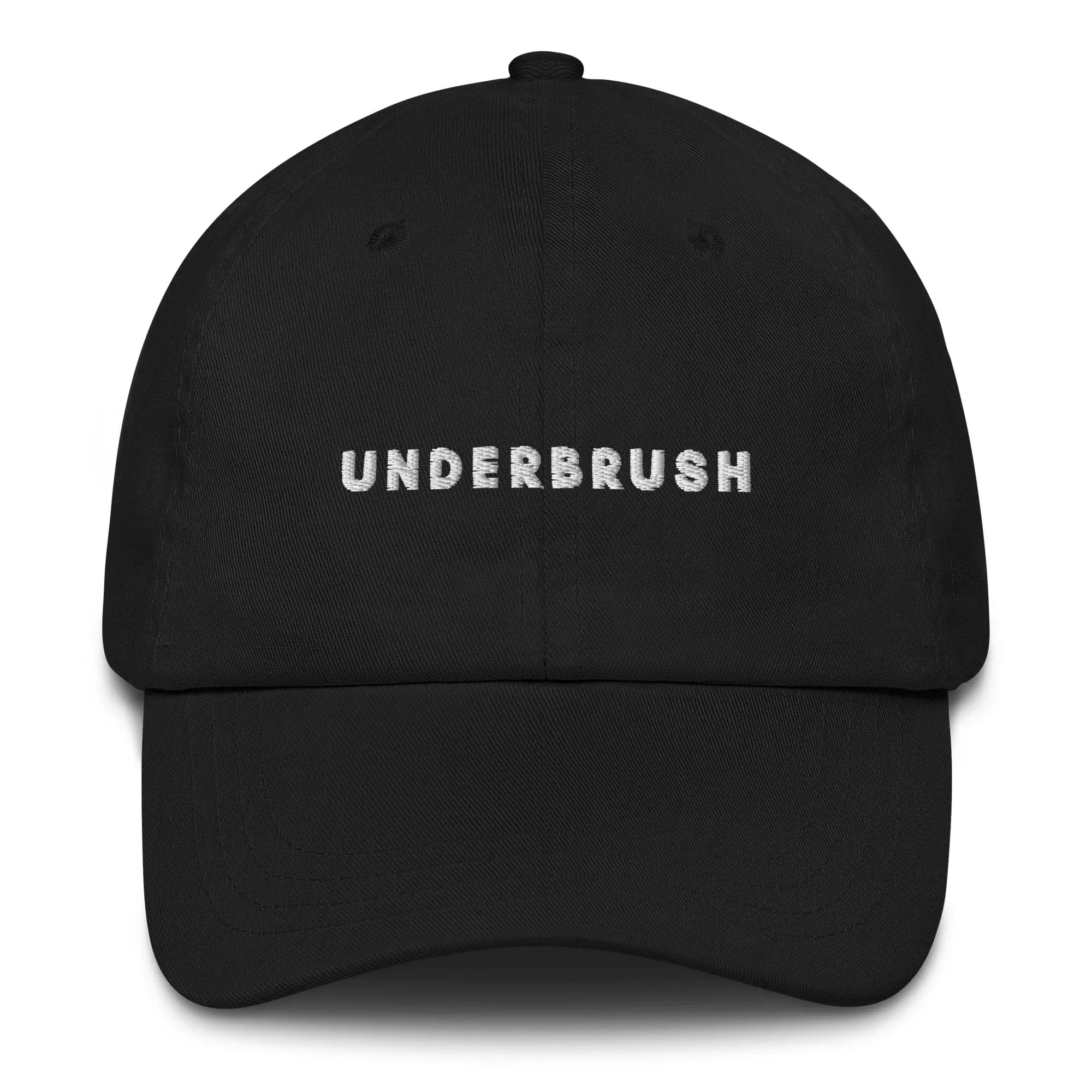 Frontal view of product mockup of Black classic dad hat with white embroidered "UNDERBRUSH" logo centered on the front.