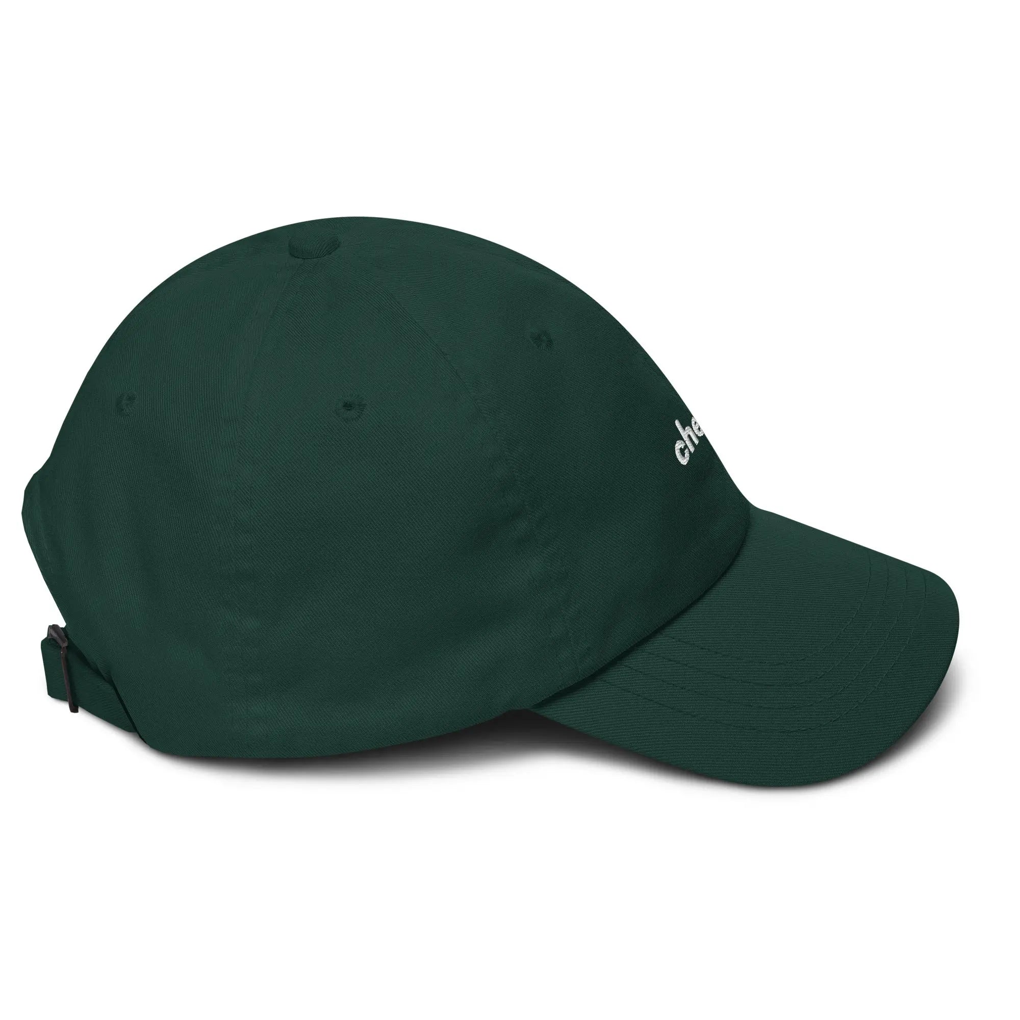 Right side view of product mockup of spruce classic dad hat with white embroidered "Chew" logo centered on the front and with white embroidered "Underbrush" logo centered on the back