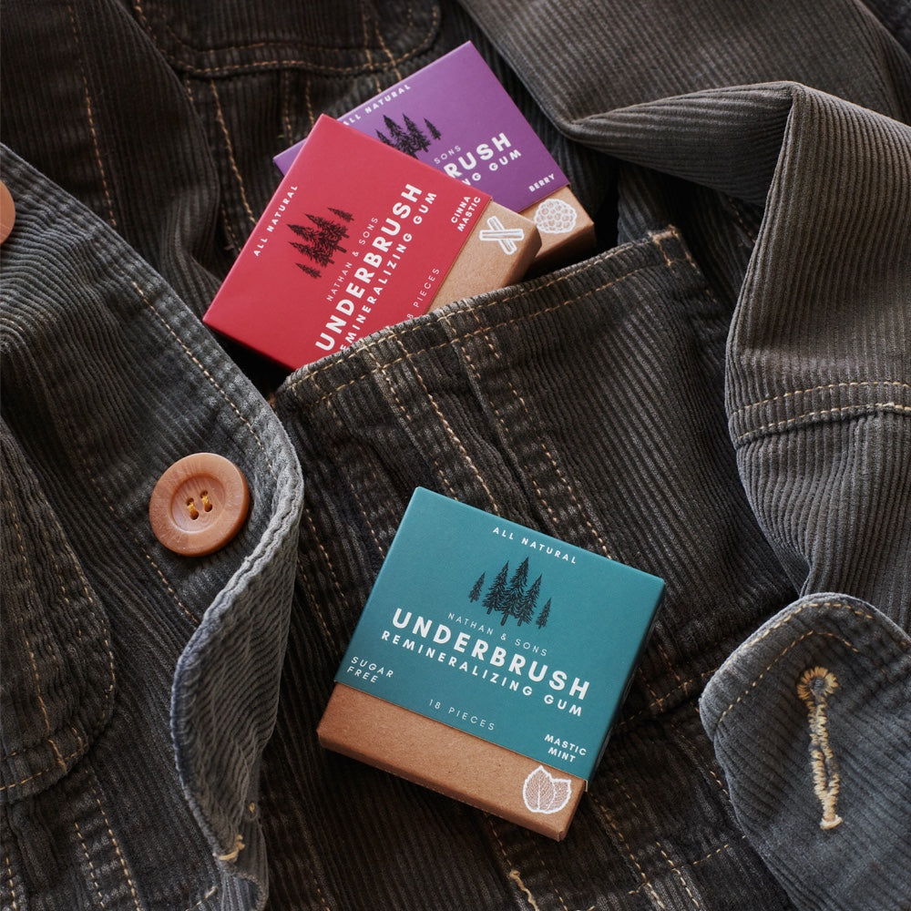 Boxes of xylitol chewing gum on a jean jacket